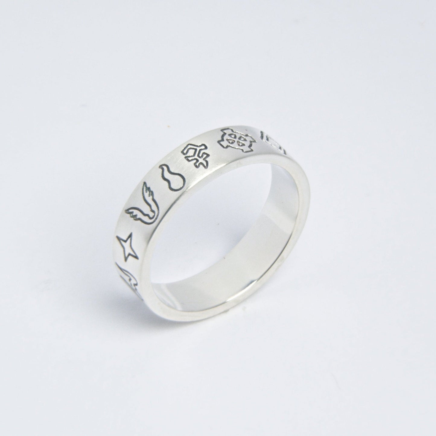 Slim silver ring with engraved OSRS gods symbols