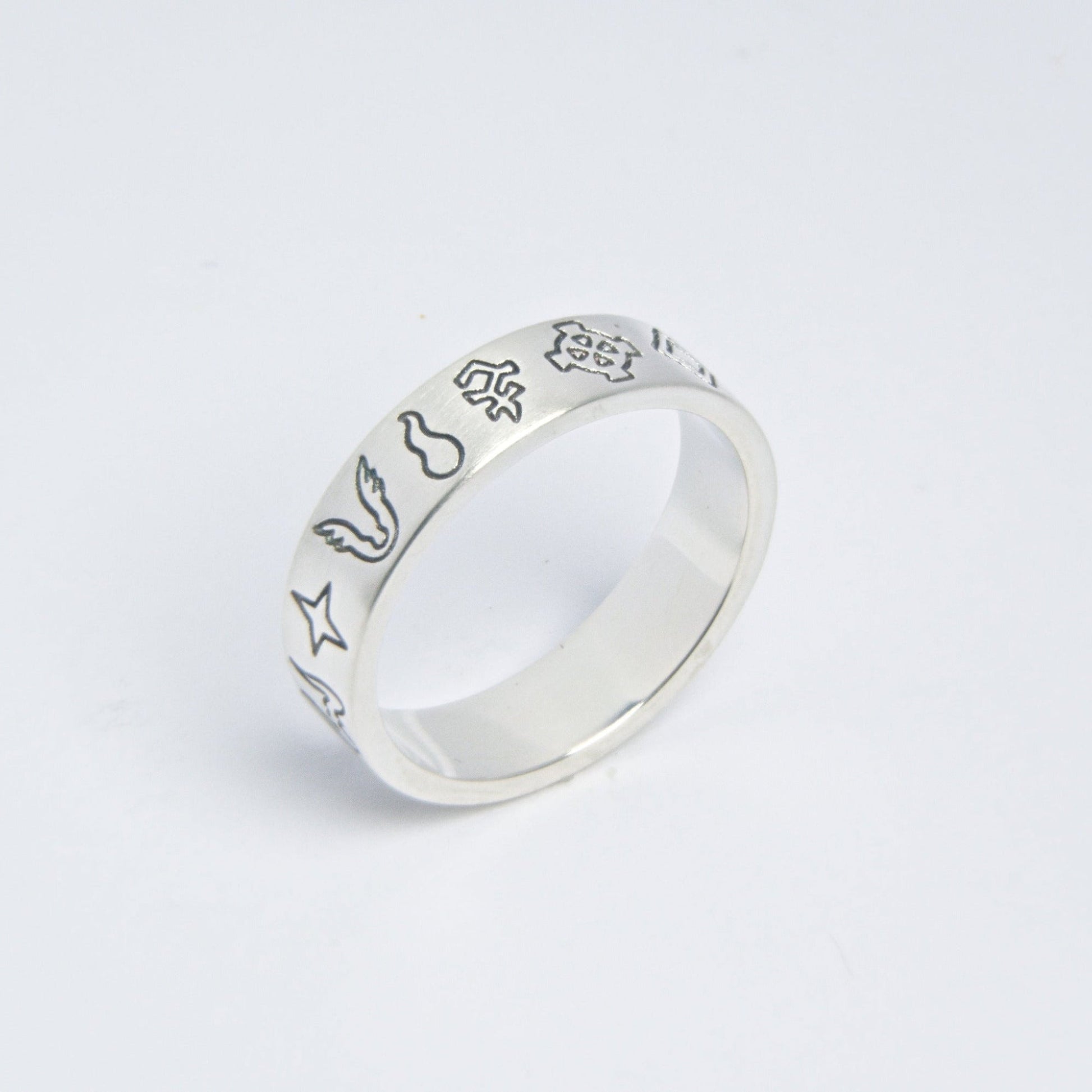 Slim silver ring with engraved OSRS gods symbols