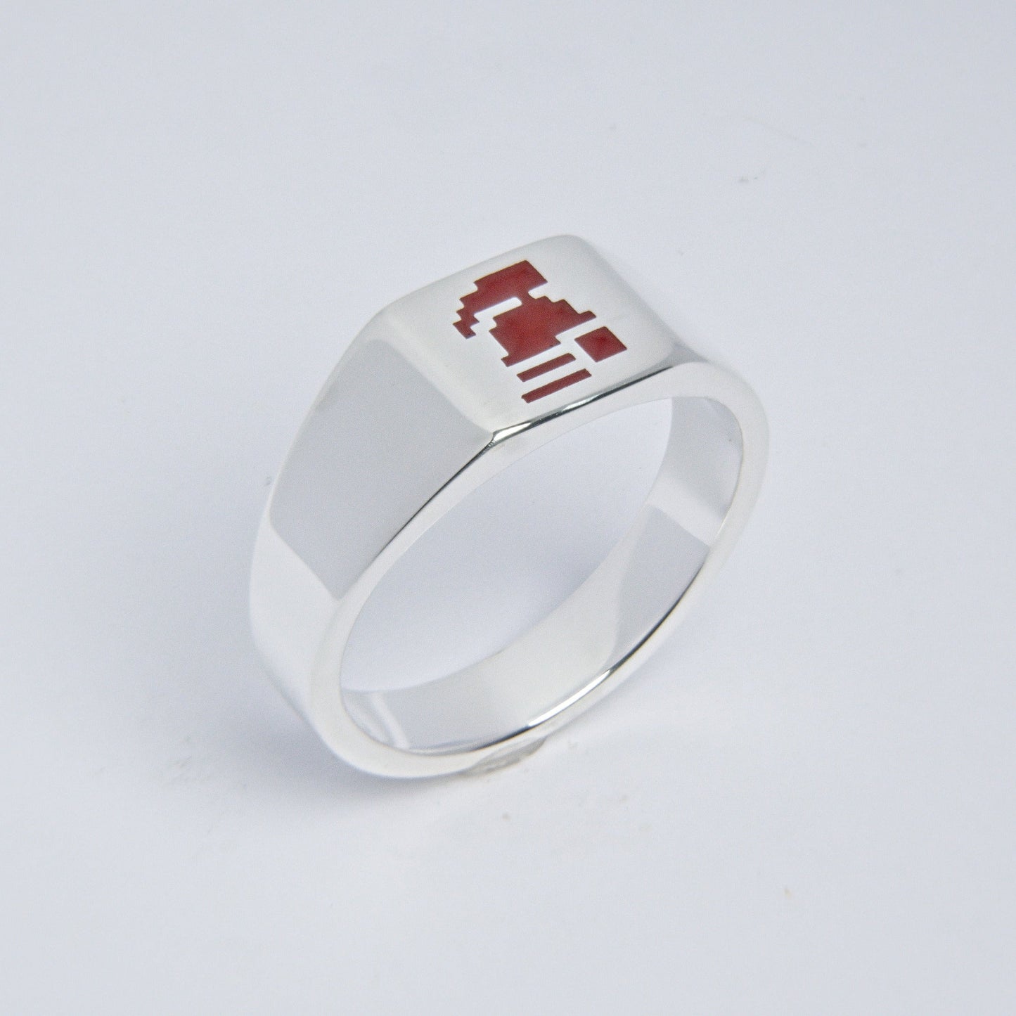 Sterling Silver Ring featuring the HCIM logo in ceramic enamel on its face